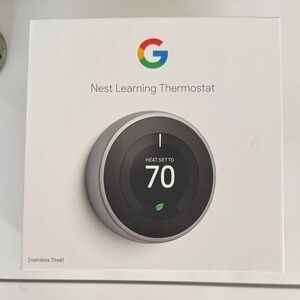 Google Nest Thermostat - Black and Silver New in box